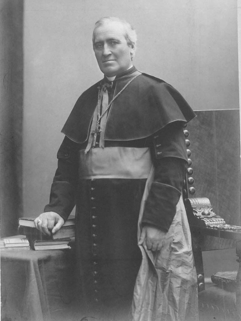 Archbishop John Ireland posing for a photo.