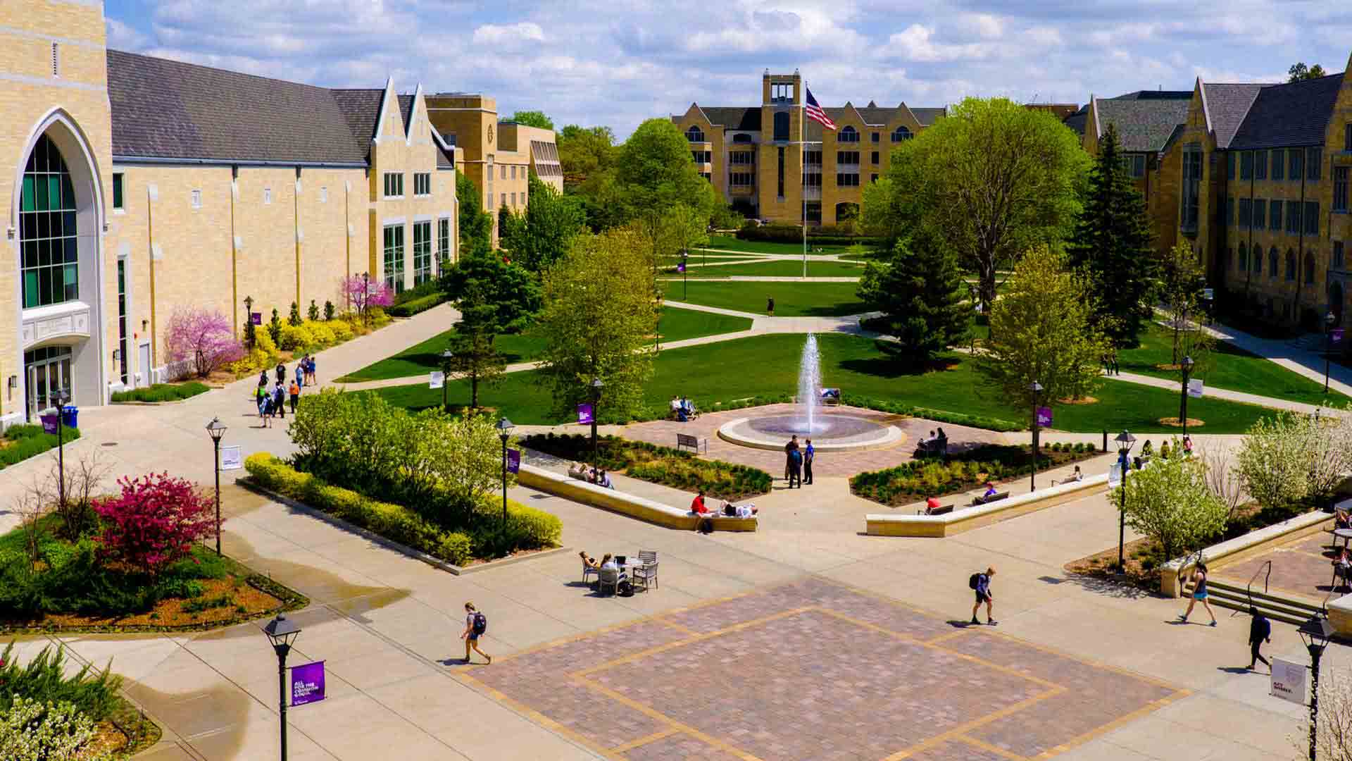 Aerial view of the John P. Monahan Plaza, Harpole fountain, lower quad and O'Shaughnessy-Frey Library.