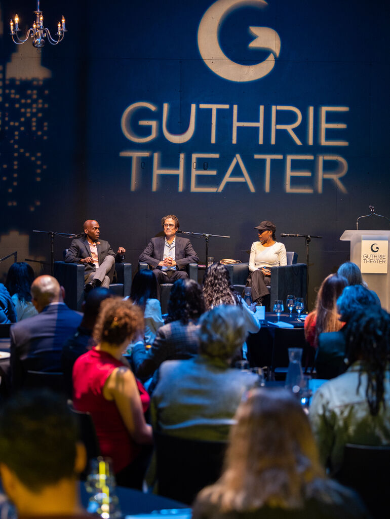 Three Speakers Sitting in Guthrie Theater Event Space