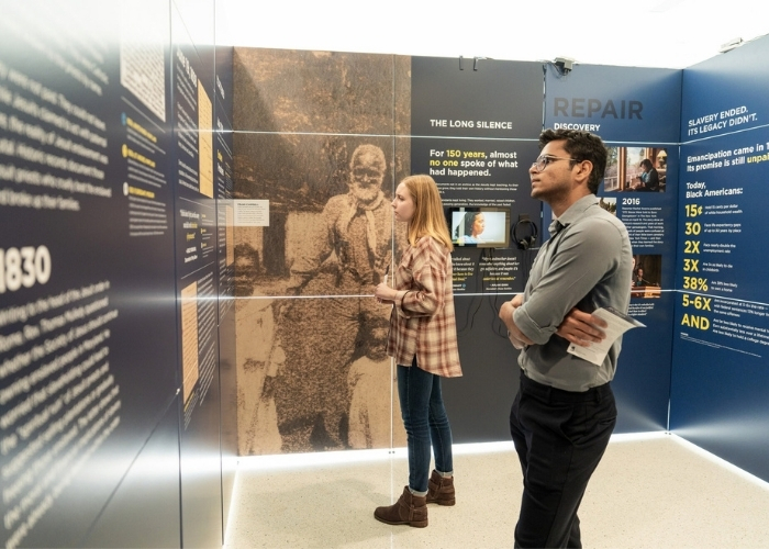 Two students experience the traveling exhibit