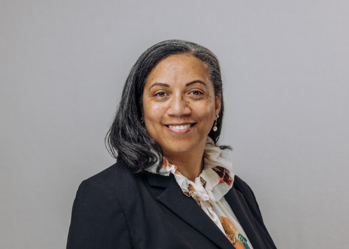 Monique Maddox smiles for a headshot