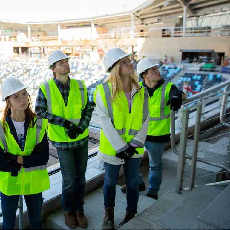Project engineers from the Minnesota United FC soccer stadium with students 