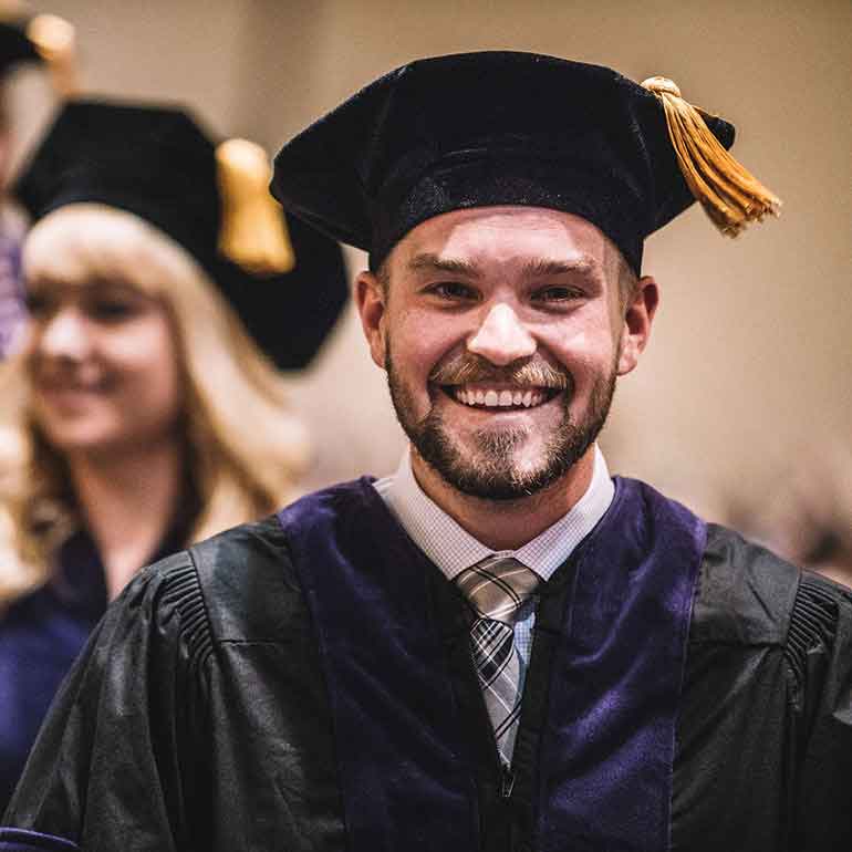 Student walk in during the 2018 School of Law Commencement Ceremony
