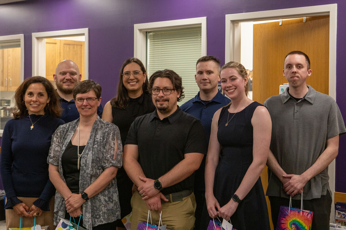 a group of veterans being recognized for graduating