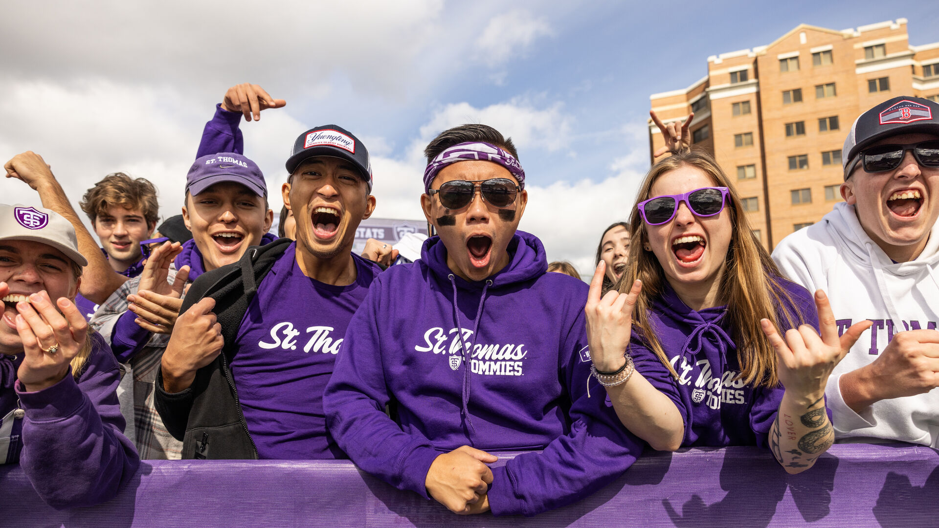 Students cheering at a sporting event