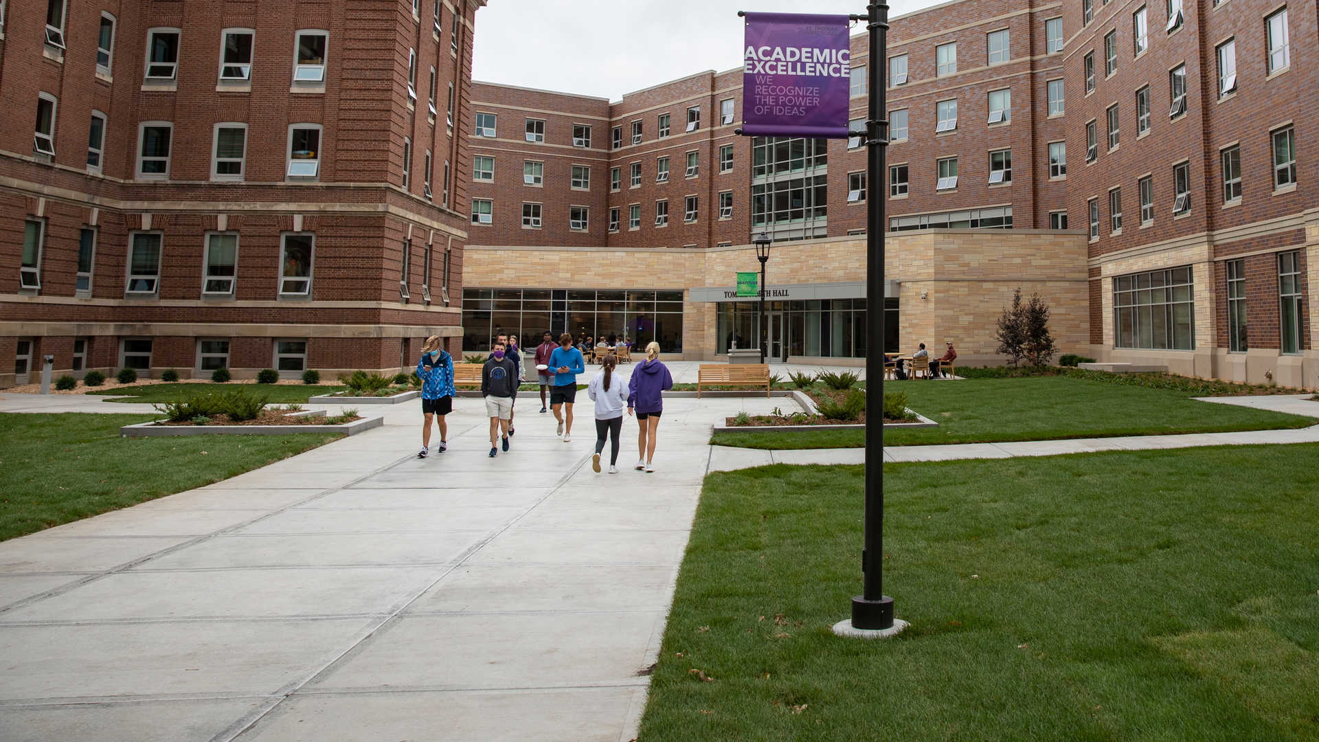 Students walking in front of residence halls
