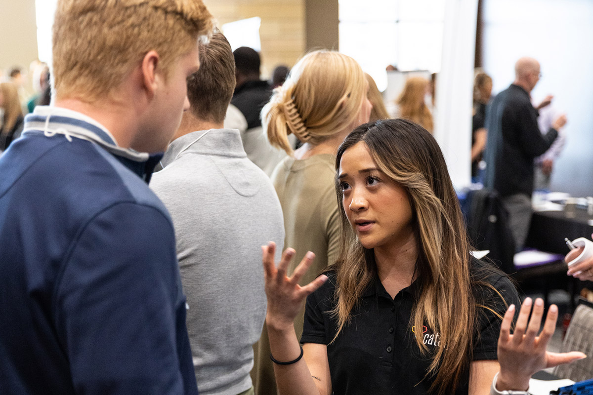A student in a discussion with a recruiter