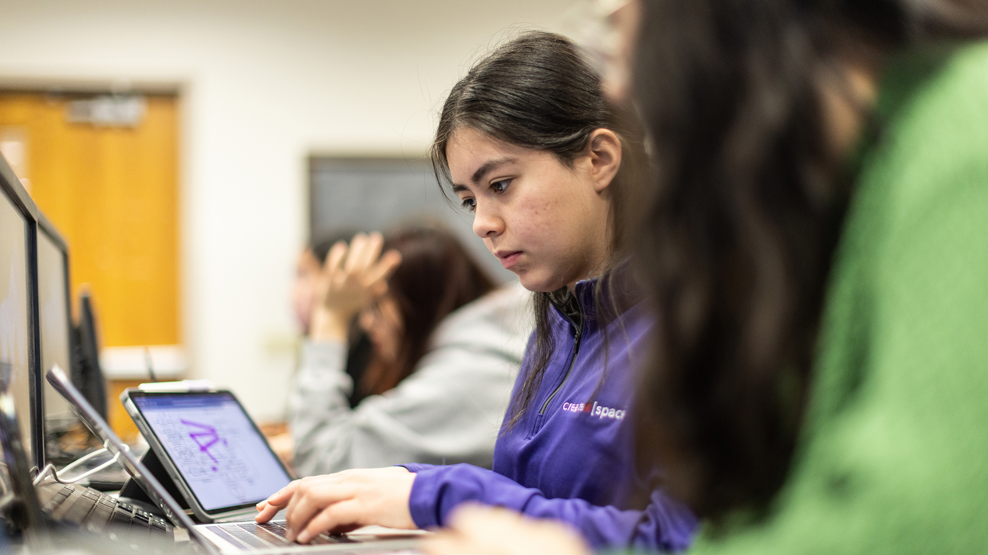Students work on computers in a Data Science class