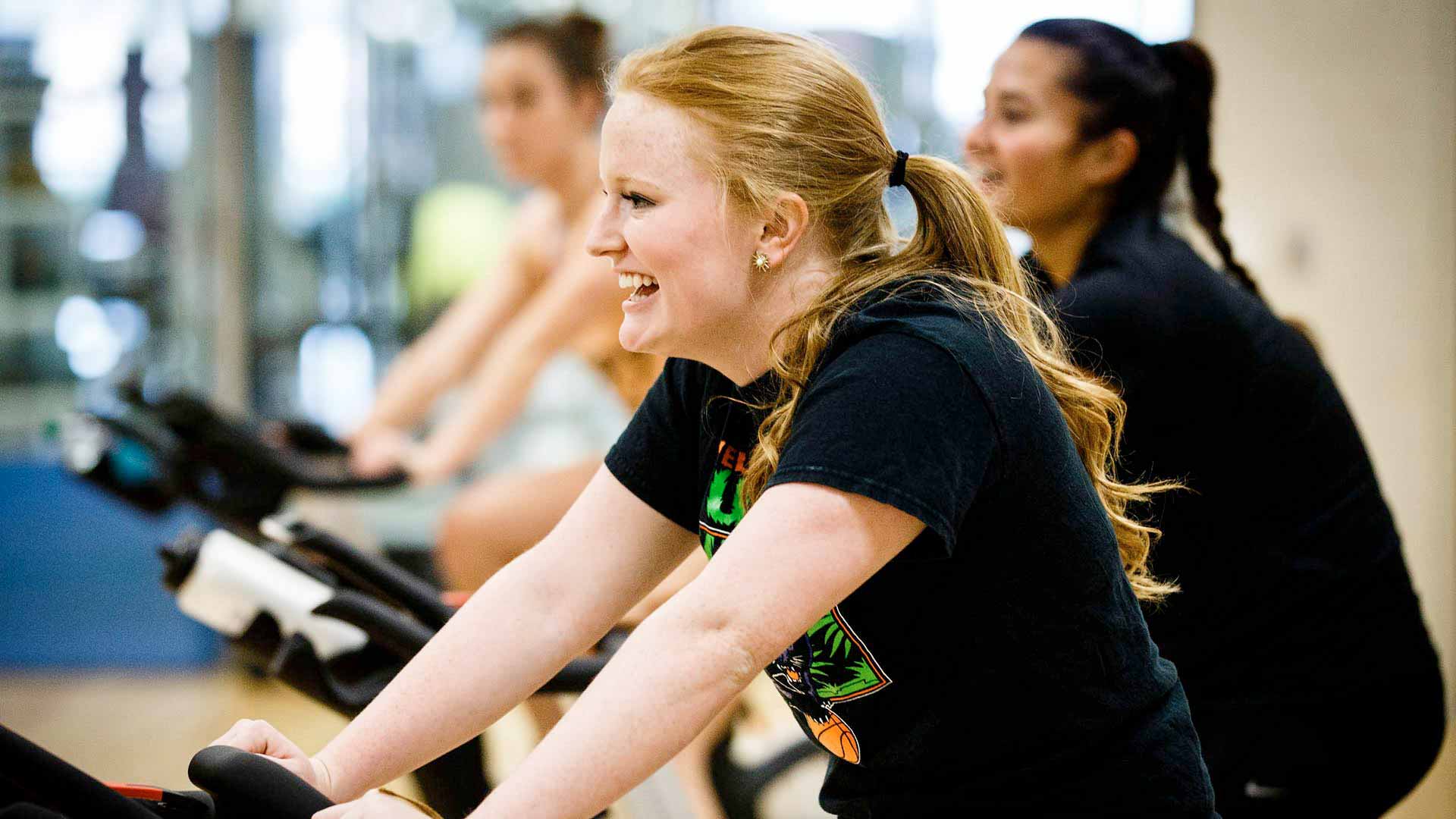 https://www.stthomas.edu/_media-library/_images/cas/health-and-exercise-science/1920x1080/exercise-science-student-cycling-class.jpg