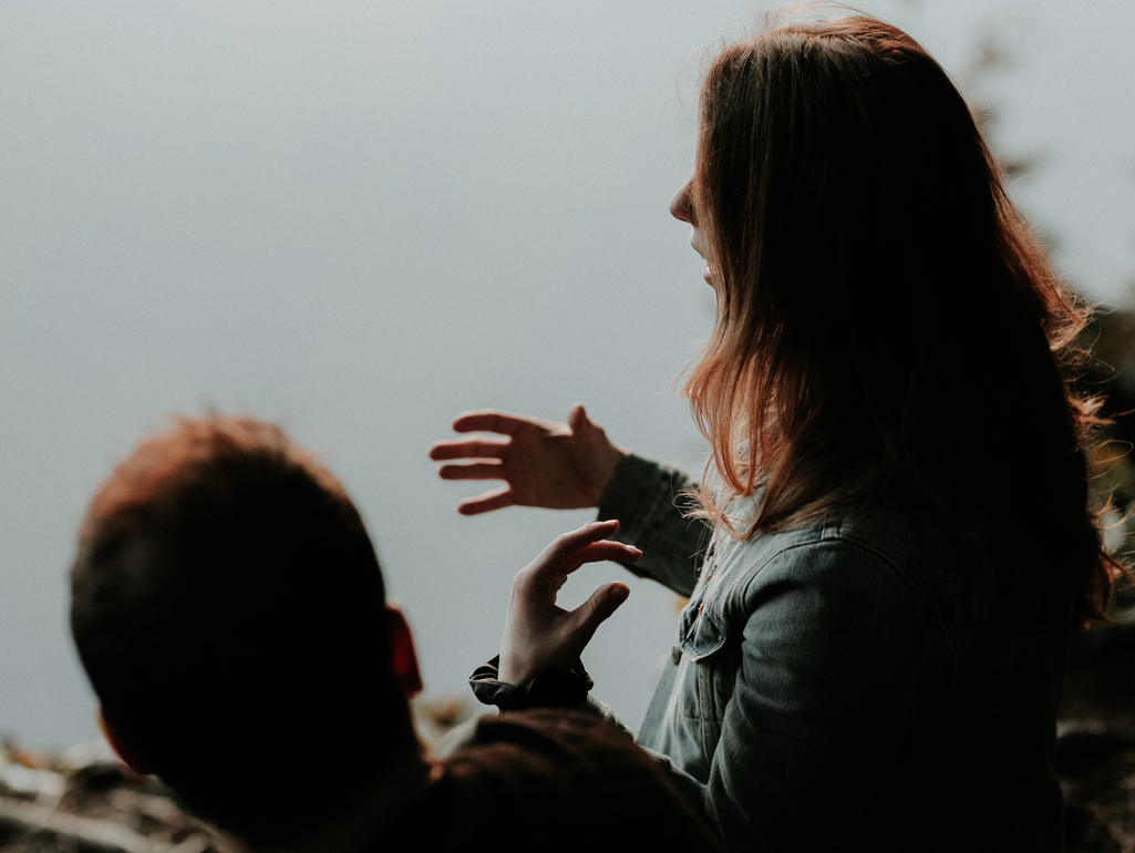 person talking in group