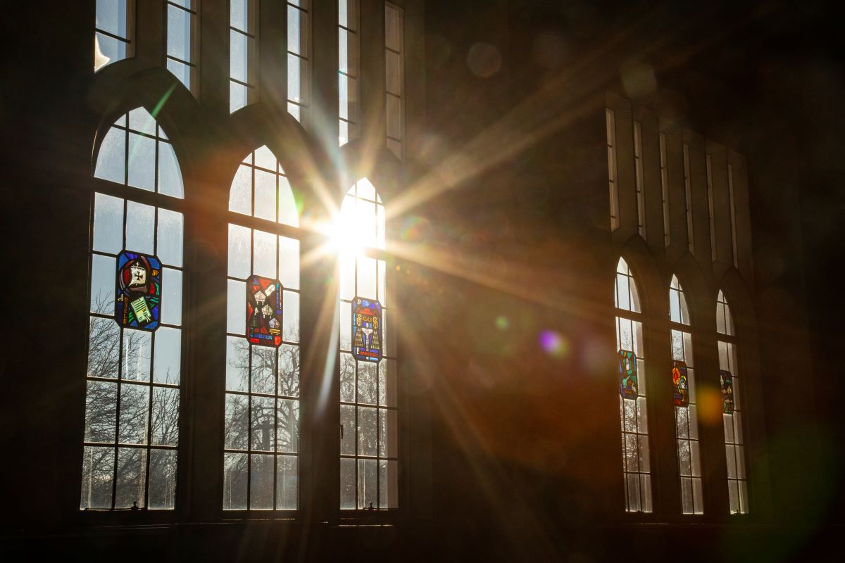 sunlight shining through stained glass windows