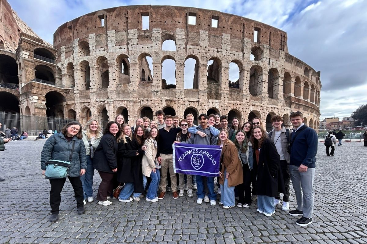 St. Thomas Engineering students gather outside the Colosseum in Rome Italy.