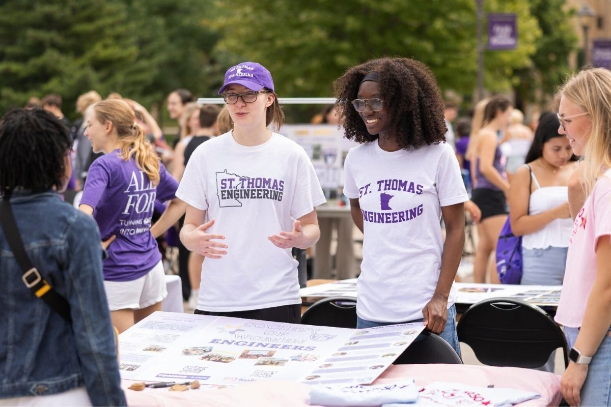 Engineering students gather outside for an activities and club fair