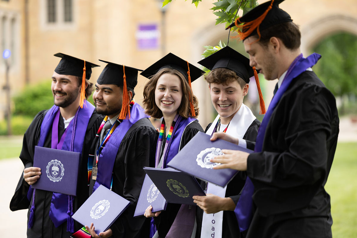 St. Thomas School of Engineering graduates in ceremonial regalia.