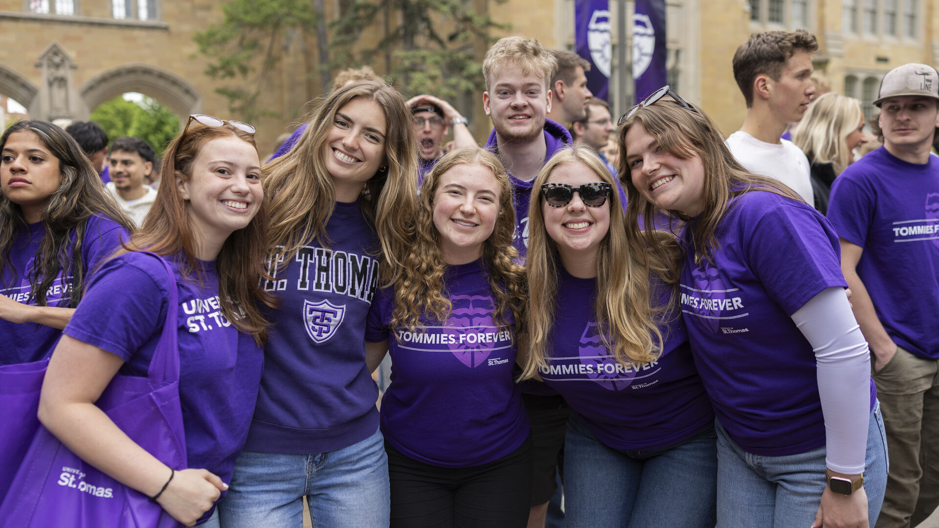Students smiling during the Walk Out of the Arches event