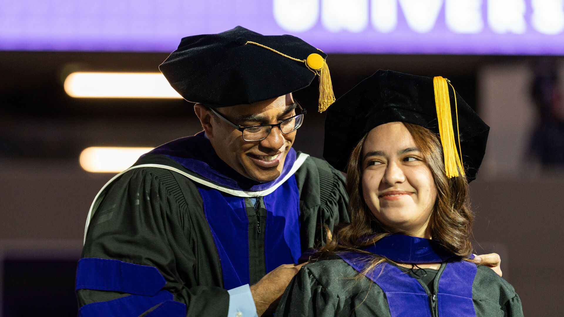 Dean Grenardo and a student at the law school commencement