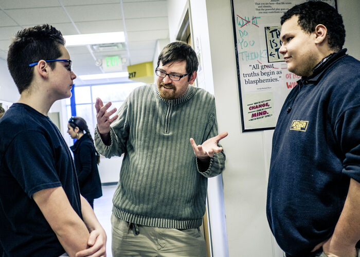 Professor speaking to students