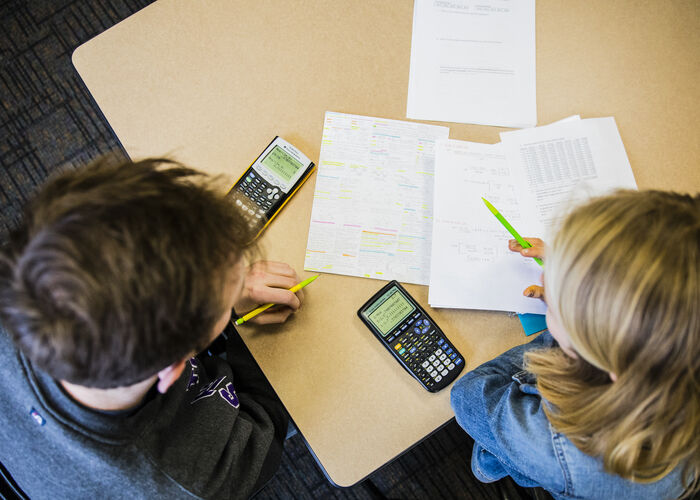 Students working with calculators