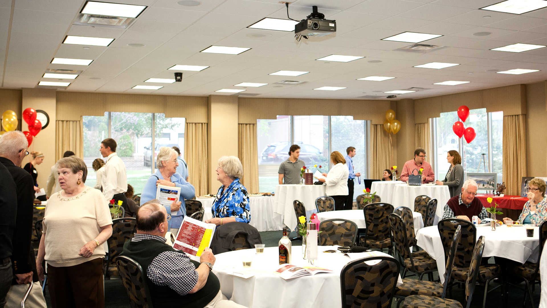 Guests socialize in the McNeely Hall Great Room