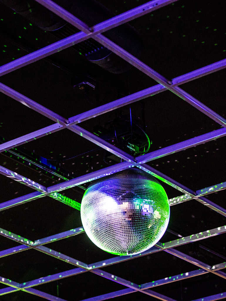 disco ball on the ceiling during karaoke in the Dance hall
