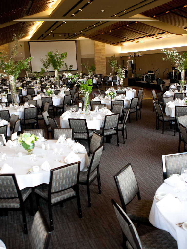  A wedding reception takes place in the James B. Woulfe Alumni Hall