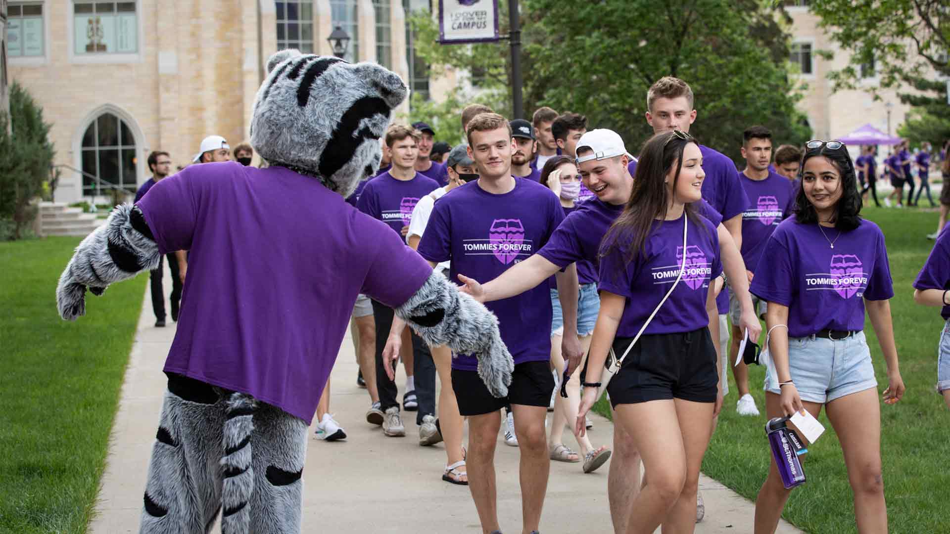 Tommie Mascot greets students
