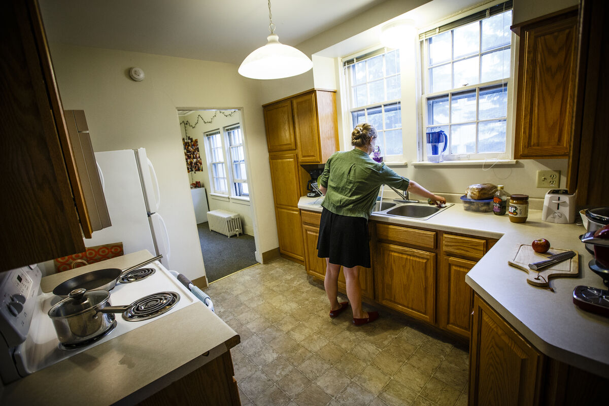 woman in a kitchen of an apartment