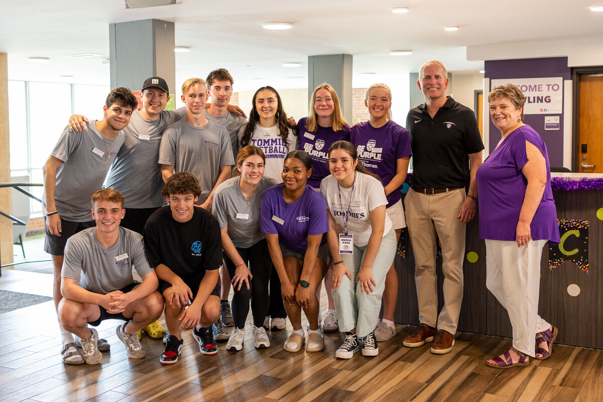 Students pose with President Vischer