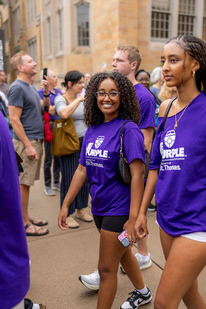 students wearing purple shirts