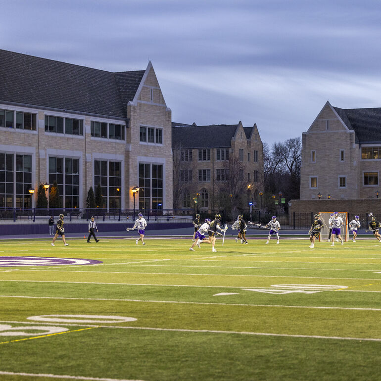 club sports playing a game at the stadium