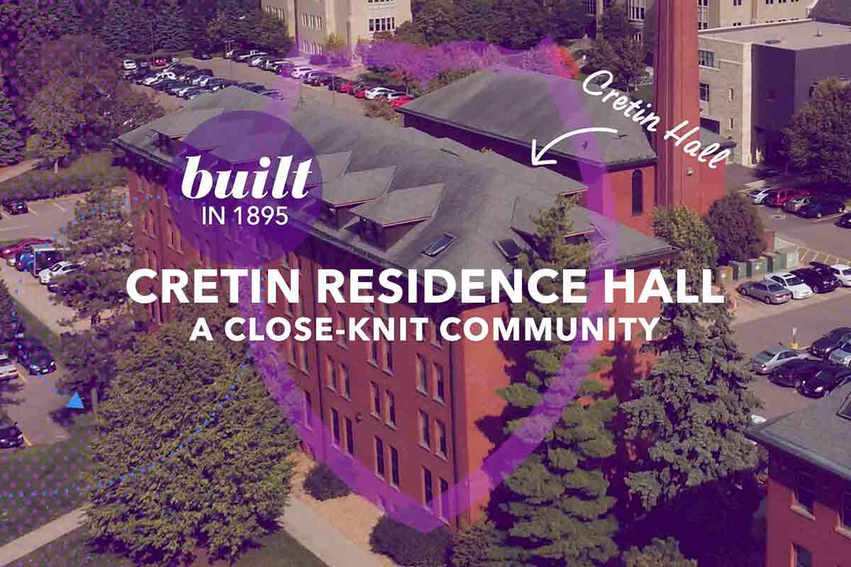 screenshot from video with an aerial view f cretin hall