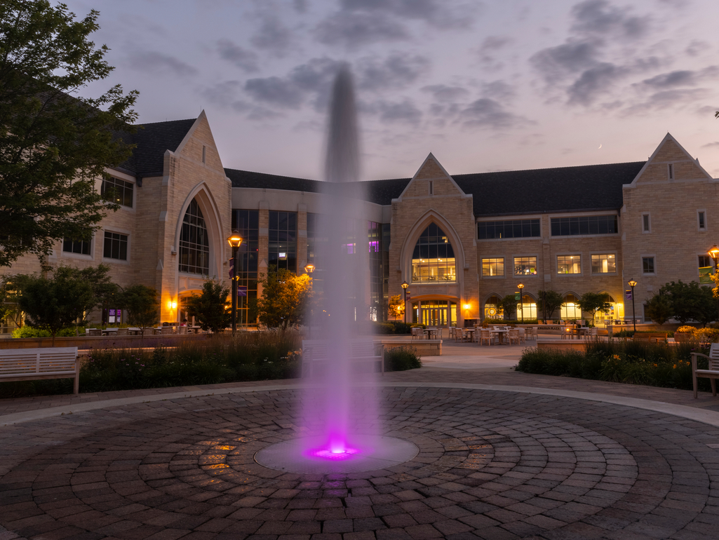 The Anderson Student Center and Harpole Fountain and Monahan Plaza at dusk on July 12, 2021 in St. Paul.