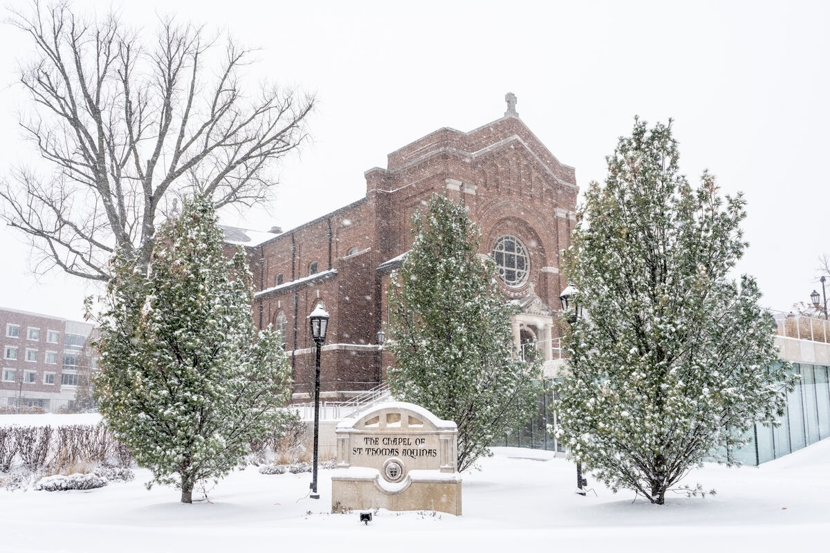 Snow coming down in front of the Chapel