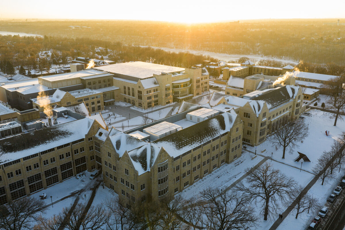 Aerial of St Paul campus with snow on the ground and buildings