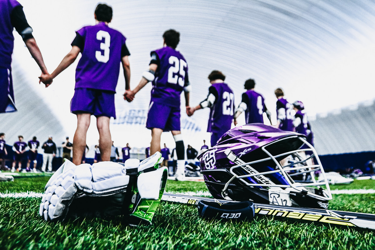 Lacrosse players high giving